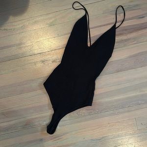 Black knit bodysuit with lace up back from revolve